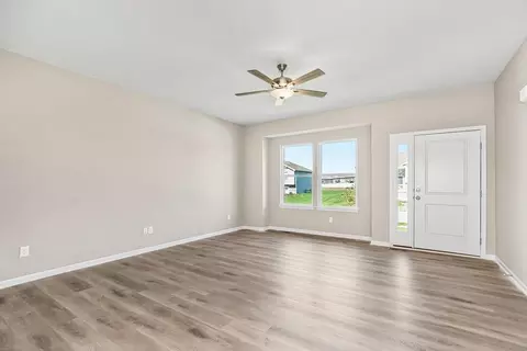 Living - 704 Blazing Star Dr, Raymore, MO 64083 photo 2 of 5