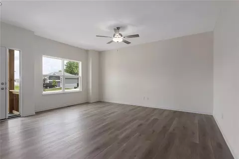 Living - 704 Blazing Star Dr, Raymore, MO 64083 photo 2 of 6