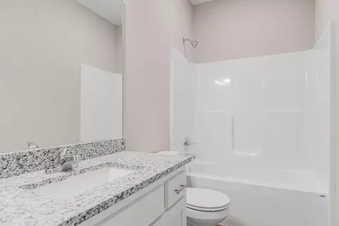 Bath - 704 Blazing Star Dr, Raymore, MO 64083 photo 3 of 3