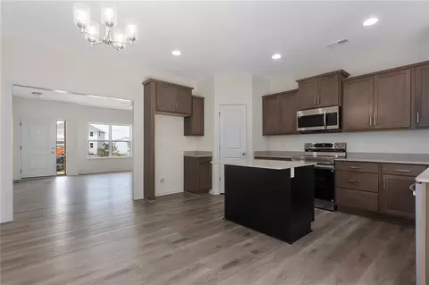 Kitchen - 704 Blazing Star Dr, Raymore, MO 64083 photo 2 of 4