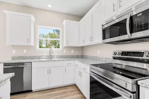 Kitchen - 704 Blazing Star Dr, Raymore, MO 64083 photo 3 of 4