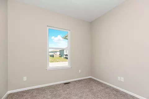 Bedroom - 704 Blazing Star Dr, Raymore, MO 64083 photo 2 of 6