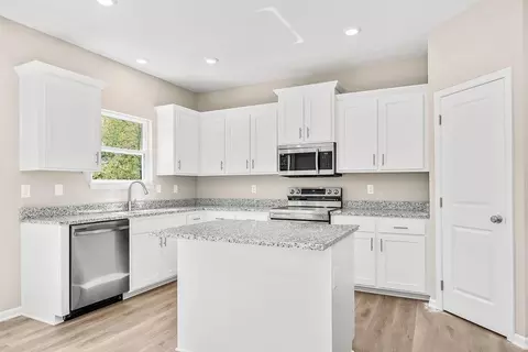 Kitchen - 704 Blazing Star Dr, Raymore, MO 64083 photo 2 of 4