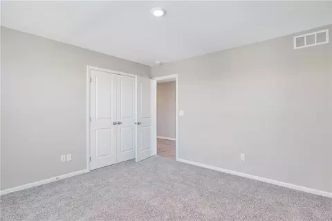 Bedroom - 603 Foxglove Ln, Raymore, MO 64083 photo 9 of 9