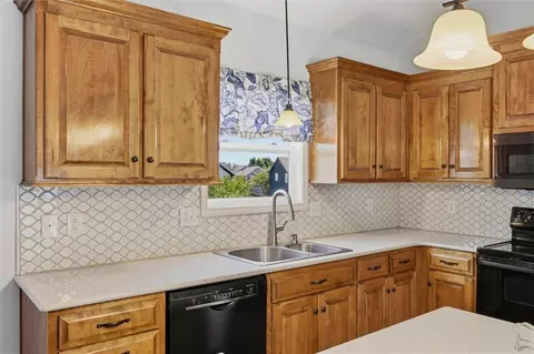 Kitchen - 503 River Birch Rd, Raymore, MO 64083 photo 2 of 2