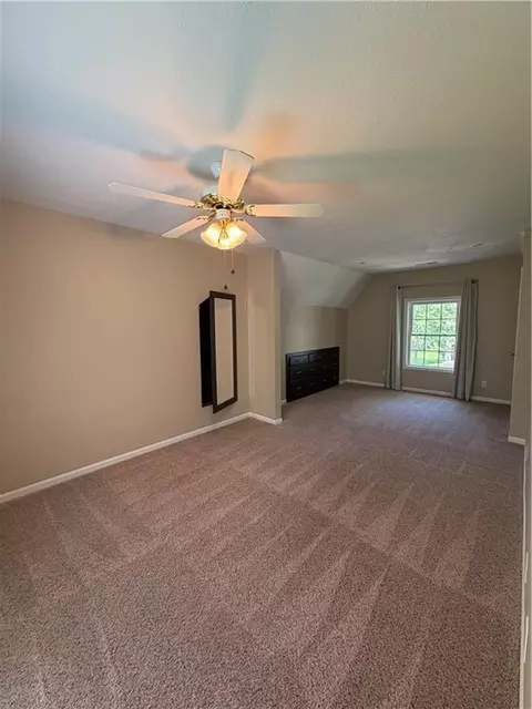 Bedroom - 5817 NE Ruby Ct, Lees Summit, MO 64064 photo 1 of 6
