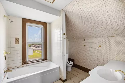 Bath - 302 E 4th St, Milan, MO 63556 photo 1 of 2