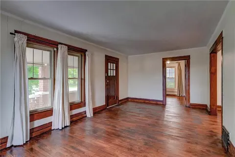 Living - 300 W 3rd St, Freeman, MO 64746 photo 3 of 3