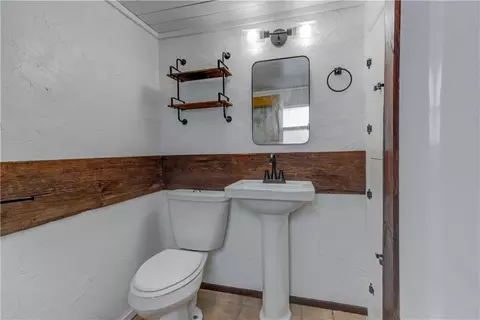 Bath - 300 W 3rd St, Freeman, MO 64746 photo 2 of 2