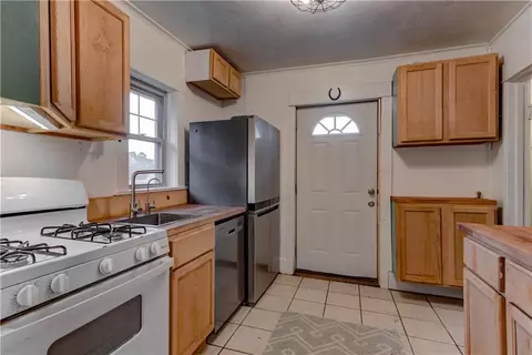Kitchen - 300 W 3rd St, Freeman, MO 64746 photo 1 of 3