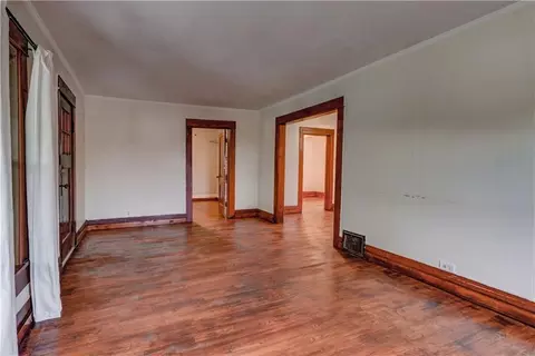Living - 300 W 3rd St, Freeman, MO 64746 photo 2 of 3