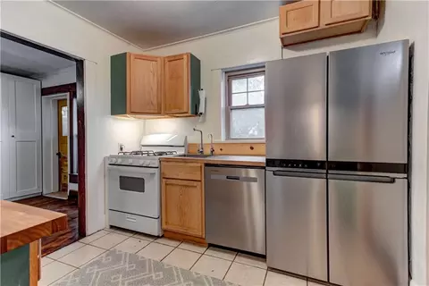 Kitchen - 300 W 3rd St, Freeman, MO 64746 photo 3 of 3