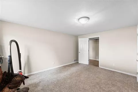 Bedroom - 205 Aquila Dr, Cameron, MO 64429 photo 8 of 9