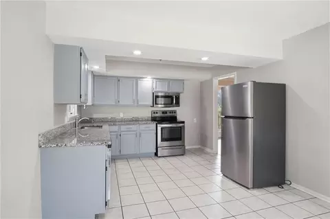 Kitchen - 11401 E 61st Ter, Raytown, MO 64133 photo 3 of 4