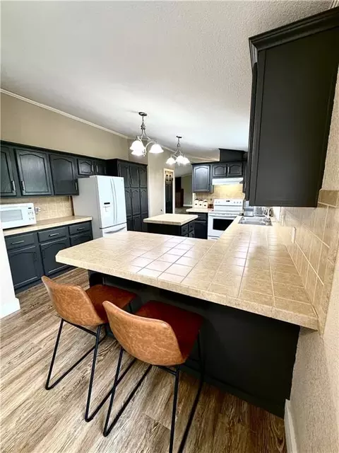 Kitchen - 114 E Oak St, Emma, MO 65327 photo 4 of 5