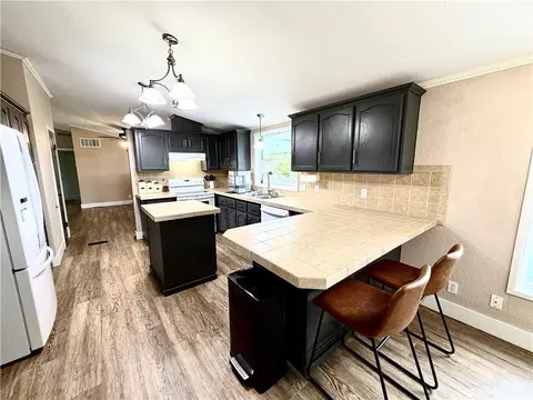 Kitchen - 114 E Oak St, Emma, MO 65327 photo 2 of 5