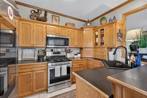 Kitchen - 410 E Neil Chiles Rd, Buckner, MO 64016 photo 1 of 3