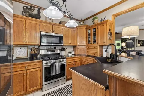 Kitchen - 410 E Neil Chiles Rd, Buckner, MO 64016 photo 1 of 3