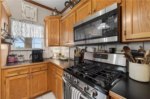Kitchen - 410 E Neil Chiles Rd, Buckner, MO 64016 photo 3 of 3