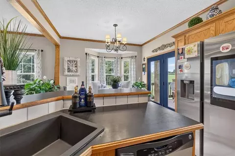 Kitchen - 410 E Neil Chiles Rd, Buckner, MO 64016 photo 3 of 3