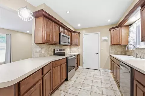 Kitchen - 203 N Murphy Dr, Raymore, MO 64083 photo 1 of 4