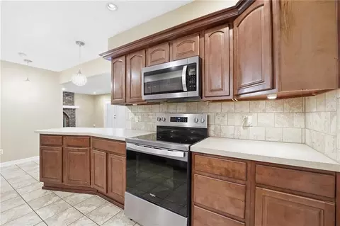Kitchen - 203 N Murphy Dr, Raymore, MO 64083 photo 3 of 4