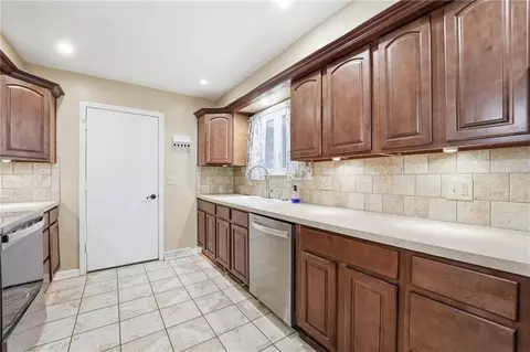 Kitchen - 203 N Murphy Dr, Raymore, MO 64083 photo 2 of 4