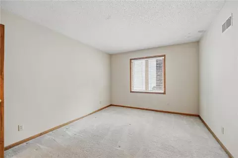 Bedroom - 4142 NE Hampstead Dr, Lees Summit, MO 64064 photo 4 of 10