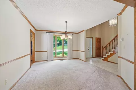 Living - 4142 NE Hampstead Dr, Lees Summit, MO 64064 photo 1 of 10