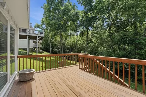 Exterior - 4142 NE Hampstead Dr, Lees Summit, MO 64064 photo 7 of 14