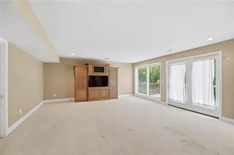 Living - 4142 NE Hampstead Dr, Lees Summit, MO 64064 photo 7 of 10