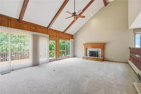 Living - 4142 NE Hampstead Dr, Lees Summit, MO 64064 photo 2 of 10
