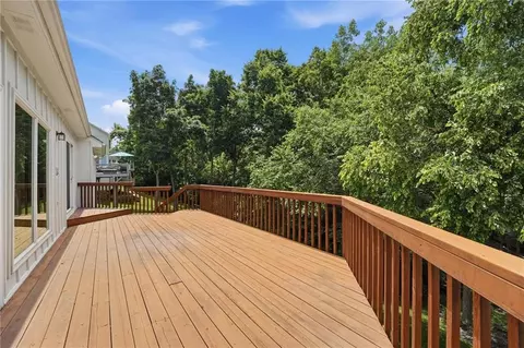 Exterior - 4142 NE Hampstead Dr, Lees Summit, MO 64064 photo 5 of 14