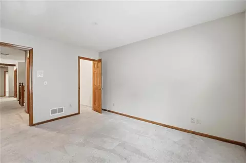 Bedroom - 4142 NE Hampstead Dr, Lees Summit, MO 64064 photo 5 of 10