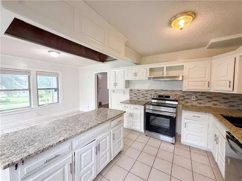 Kitchen - 11304 E 55th Ter, Raytown, MO 64133 photo 2 of 3
