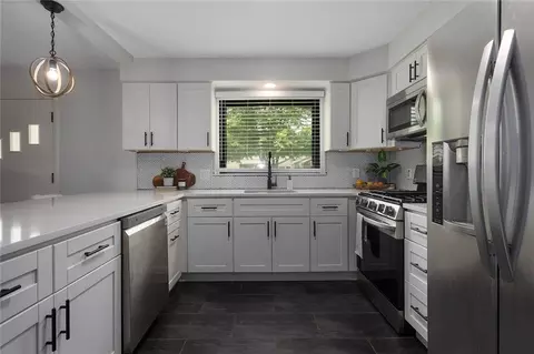 Kitchen - 209 NE Maple St, Lees Summit, MO 64063 photo 3 of 4