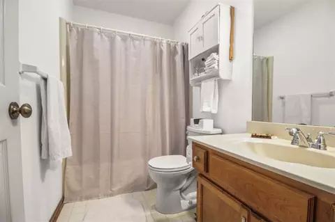 Bath - 805 E 319th St, Drexel, MO 64742 photo 2 of 4