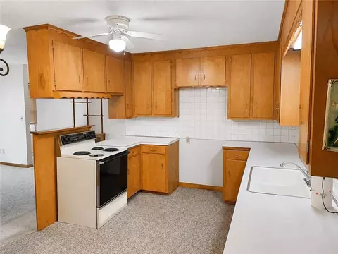 Kitchen - 511 Broad St, Warrensburg, MO 64093 photo 2 of 2