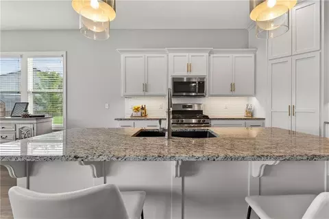 Kitchen - 1540 SW Cornwall Rd, Raymore, MO 64083 photo 1 of 4