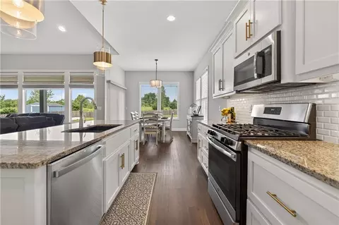 Kitchen - 1540 SW Cornwall Rd, Raymore, MO 64083 photo 4 of 4