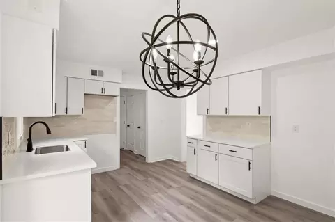 Kitchen - 307 S Sunset Ln, Raymore, MO 64083 photo 3 of 3