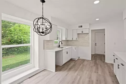 Kitchen - 307 S Sunset Ln, Raymore, MO 64083 photo 2 of 3