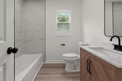 Bath - 307 S Sunset Ln, Raymore, MO 64083 photo 5 of 5