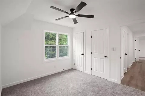 Bedroom - 307 S Sunset Ln, Raymore, MO 64083 photo 4 of 8