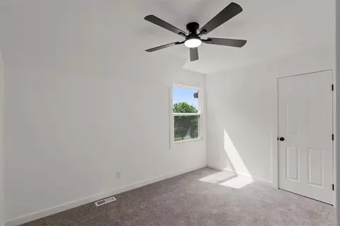 Bedroom - 307 S Sunset Ln, Raymore, MO 64083 photo 5 of 8