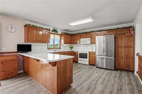 Kitchen - 705 Benjamin Ave, Gower, MO 64454 photo 2 of 3