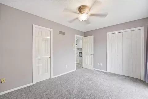 Bedroom - 212 E Hansen Ct, Independence, MO 64055 photo 7 of 9