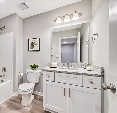 Bath - 504 Pine Dr, Odessa, MO 64076 photo 2 of 2