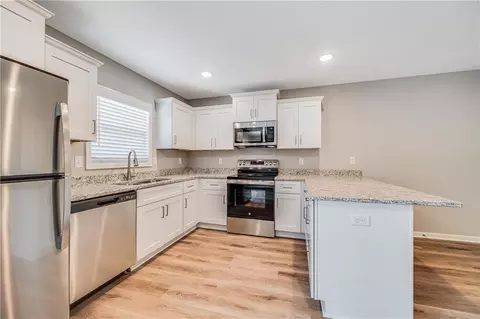 Kitchen - 504 Pine Dr, Odessa, MO 64076 photo 2 of 2