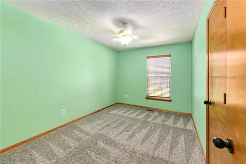 Bedroom - 644 SE Jonathon Ave, Lees Summit, MO 64063 photo 7 of 9